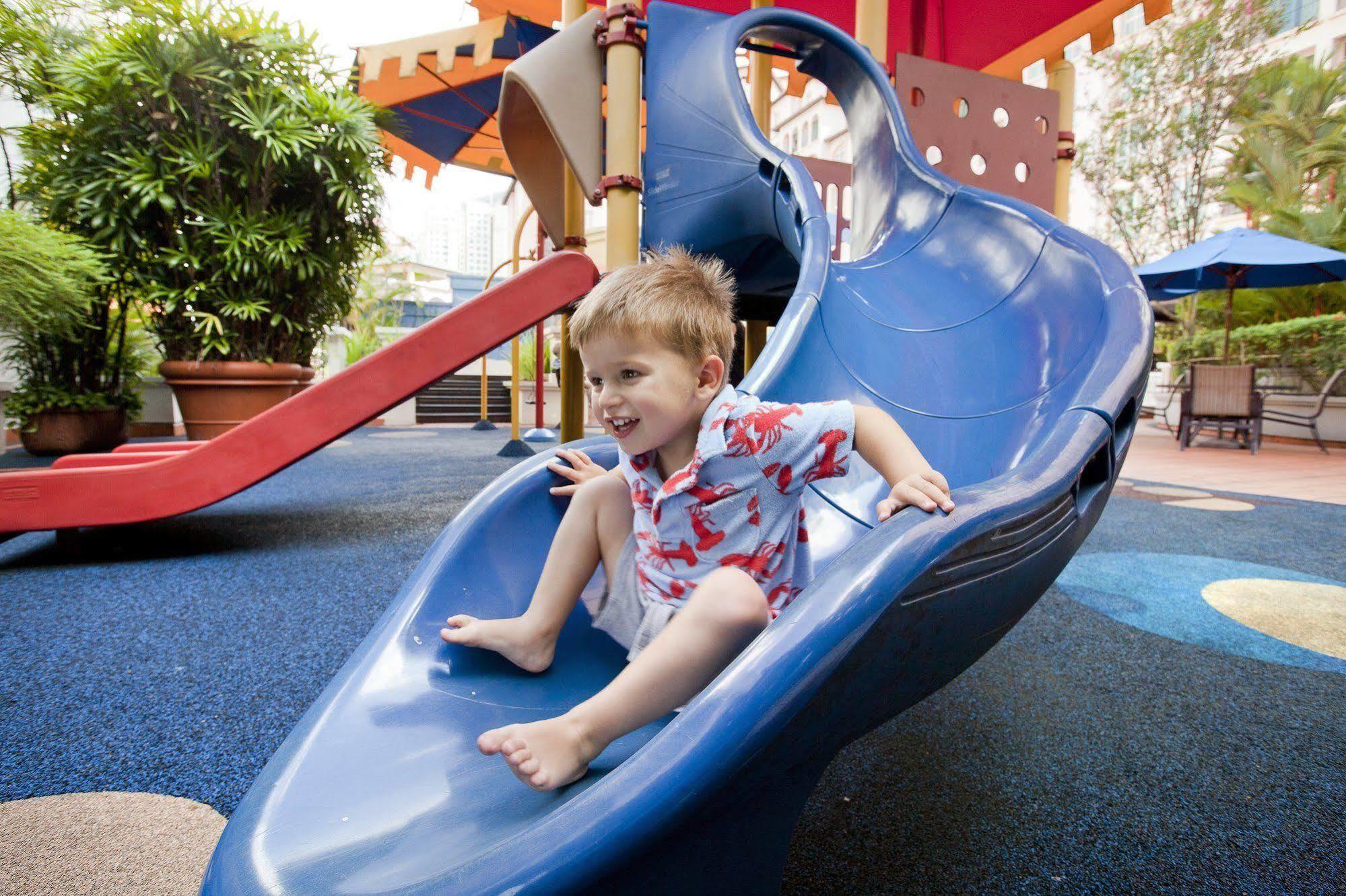 Fraser Place Robertson Walk Singapore Eksteriør billede A child on a slide